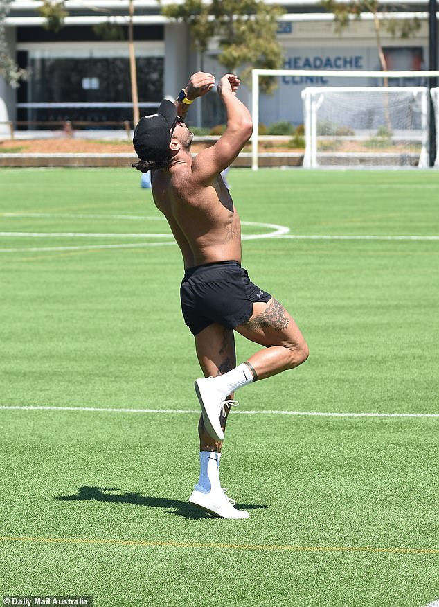 Jack ran at a leisurely pace around the football field, which is close to the cast's Skye Suites residence in Sydney, before flexing his leg muscles by kicking an AFL ball.