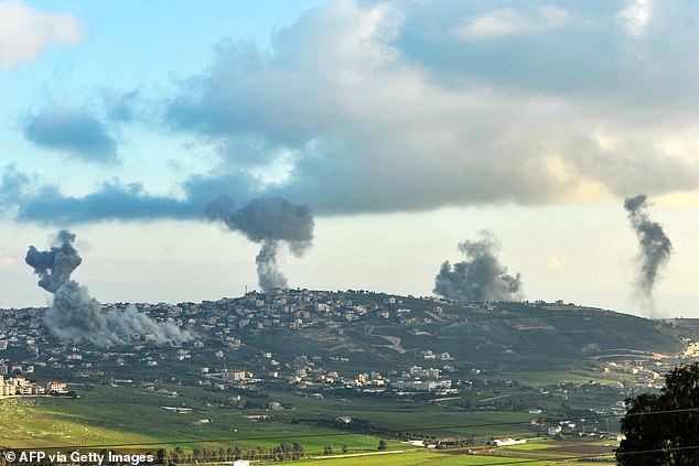 Smoke rises over the southern Lebanese border village of El-Khiam during the Israeli bombardment on February 7, 2024. Cross-border tension remains high