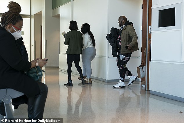 Tajahnae Brown walks out of the courtroom in the Bronx on Wednesday