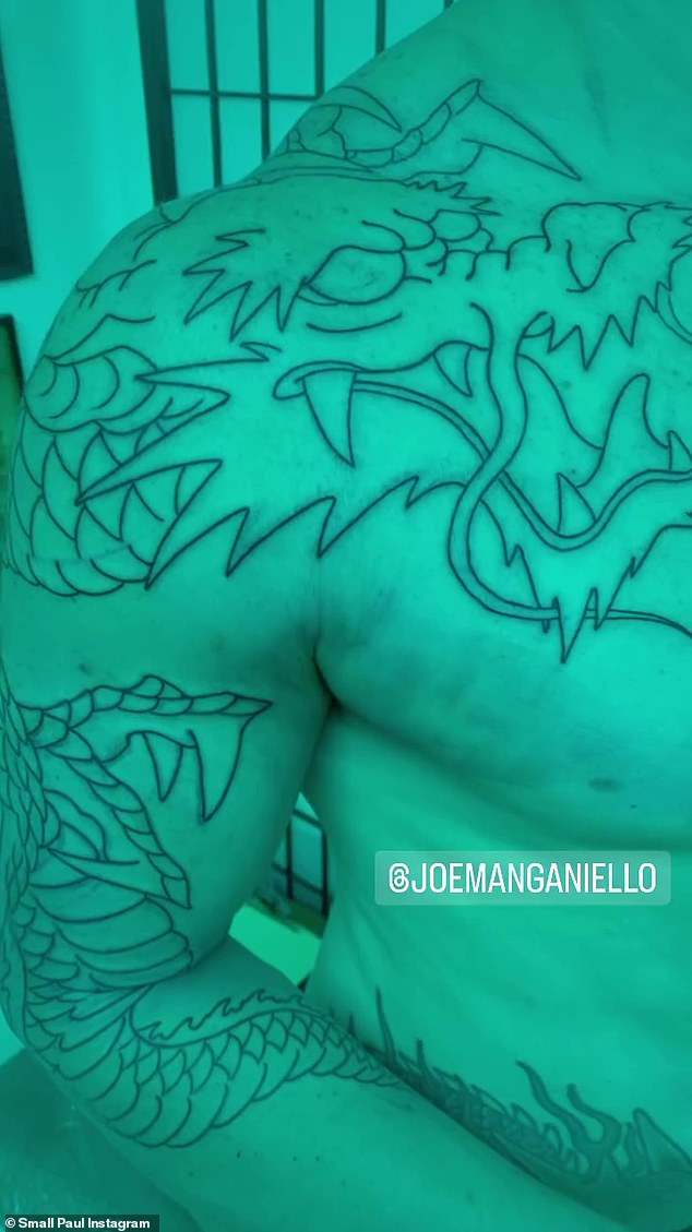 The 47-year-old hunky actor - who recently hit the gym with his girlfriend Caitlin O'Connor, 33 - showed off his giant shoulder tattoo in an Instagram story shared by tattoo artist Small Paul