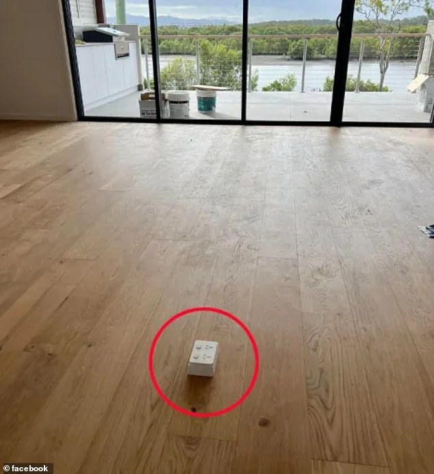 What the homeowner got was a white electrical box (pictured) with outlets on top of the floor, ruining the look of the entire room and creating a tripping hazard