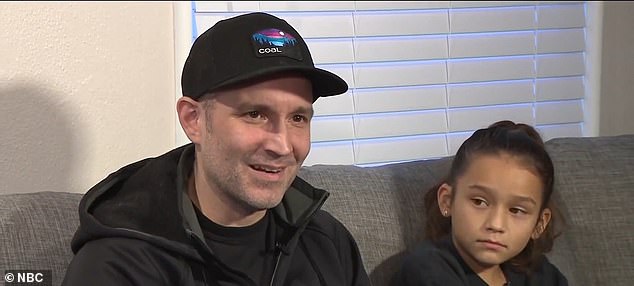 Adam Jorgenson (left) went to wash his car with his two daughters Charley, eight, (right) and Autumn, two, during a Kwik Trip in Oak Creek on Sunday