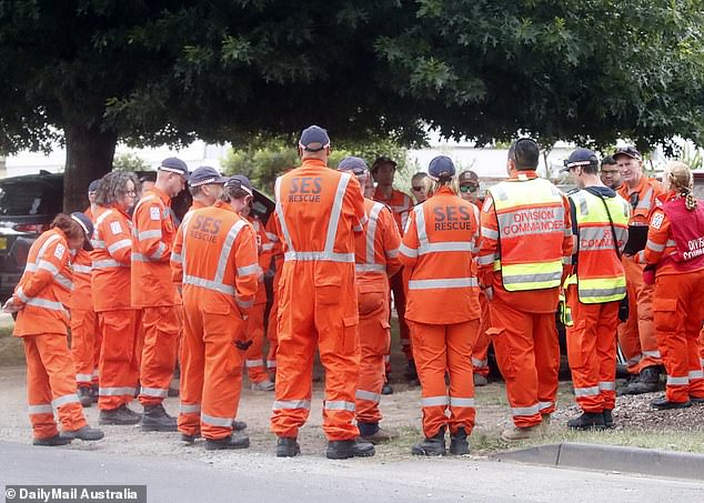 SES volunteers plan their search outside a police station in Ballarat on Thursday