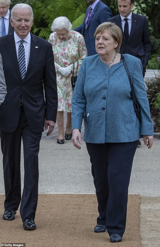 Biden, seen here walking with German Chancellor Angela Merkel at the G7 summit on June 11, 2021. In an anecdote he told donors twice in New York on Wednesday, he said the then-chancellor was Helmut Kohl.