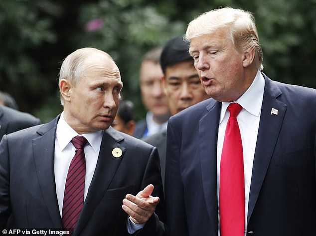 Next, US President Donald Trump and Russian President Vladimir Putin talk during the 2017 Asia-Pacific Economic Cooperation (APEC) Leaders' Summit