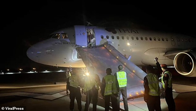 The scene at Chiang Mai International Airport.  The North American tourist's alleged outburst also disrupted other arriving flights, which had to wait in a holding pattern in the sky while departing planes were also delayed.