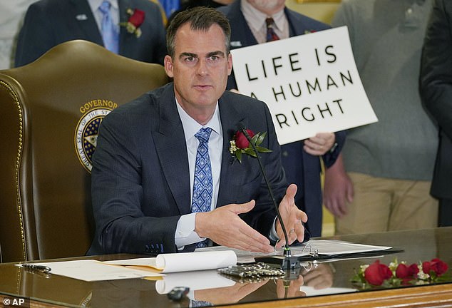 Oklahoma Gov. Kevin Stitt speaks after signing a law making abortion punishable by up to 10 years in prison