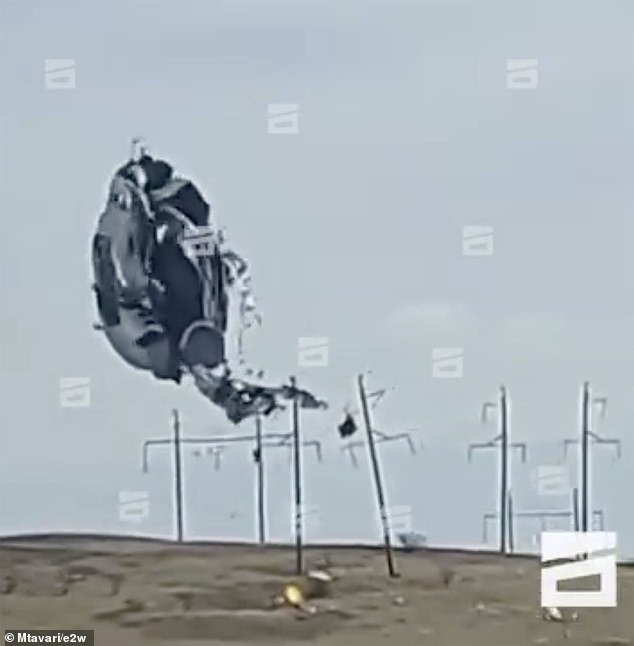 The destroyed balloon.  The plane appeared to be in trouble as it came down and even hit the ground in a field, swaying back and forth before going out of control.  Reports say strong winds contributed to the tragedy