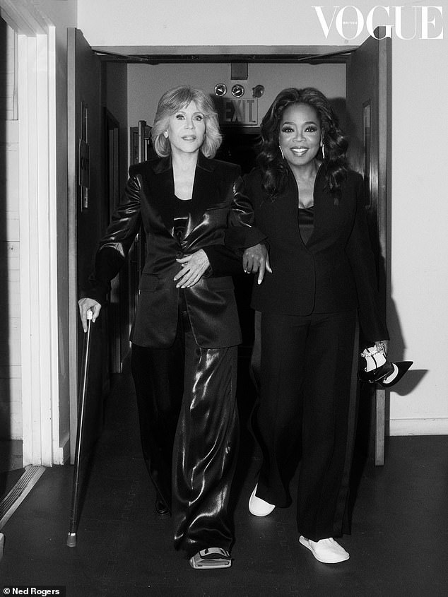 Jane Fonda was assisted by a walking stick as she walked by with close friend Oprah