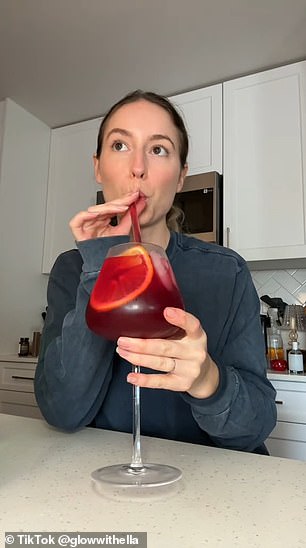 The health expert then rounded out the drink with sparkling water, a slice of orange as a decorative garnish and a few drops of digestive bitters.