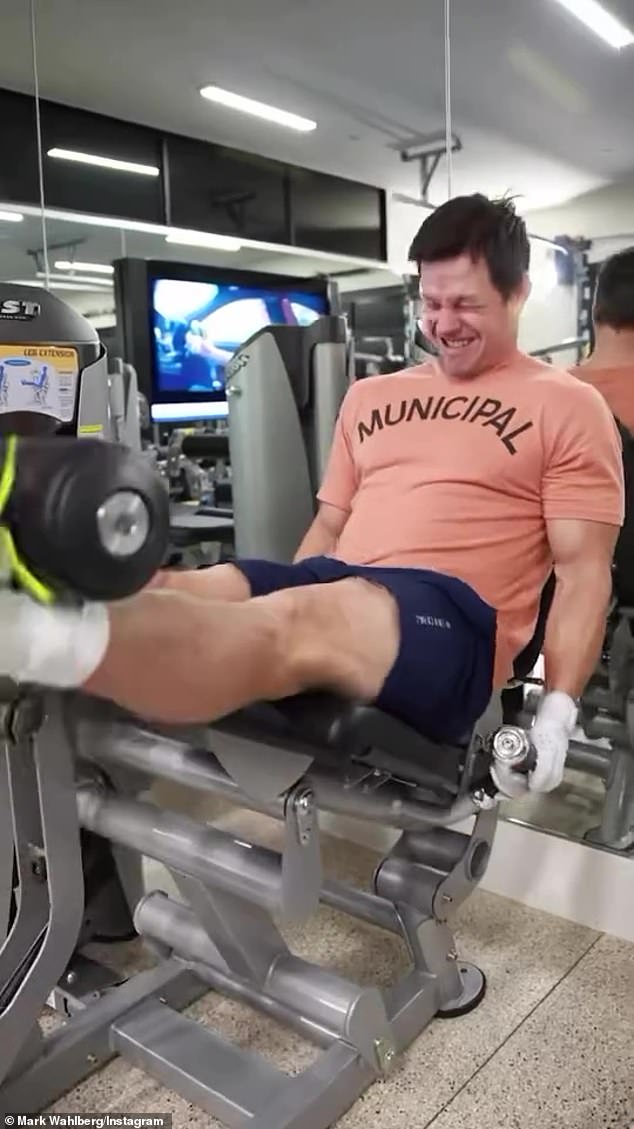 Mark made sure fans knew he wasn't skipping leg day as he performed a variety of workouts including leg presses, barbell split squats, leg extensions (pictured), deadlifts and wall squats