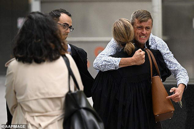 Declan Cutler's father Bryan Beattie reacts outside the County Court of Victoria in Melbourne after the guilty verdicts