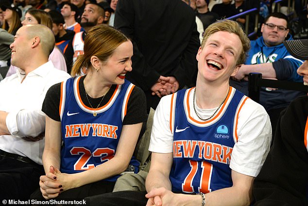 The actress was joined by Harris Dickinson, who also wore a jersey in support of the home team