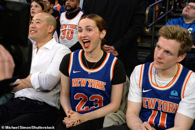 The actor wore his jersey over a white T-shirt as he watched the teams play