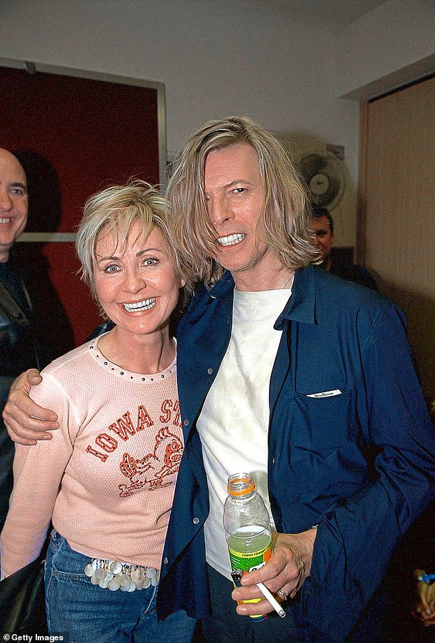 Following the announcement, Lulu also spoke to The Guardian about her dazzling all-star experiences in the spotlight - including personal experiences with icons such as David Bowie, The Rolling Stones, Iggy Pop and The Who (pictured with Bowie in 2000)