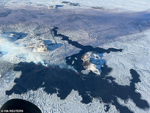 This aerial photo shows the extent of the lava flow.  You can see how the last lava flow has covered some parts of the lava left behind from the December eruption