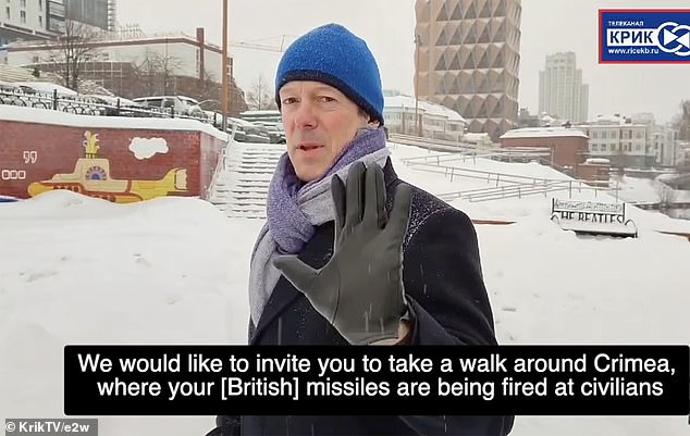 One of the men says to the ambassador: 'We would like to invite you for a walk around Crimea, where your (British) missiles are being fired at civilians'