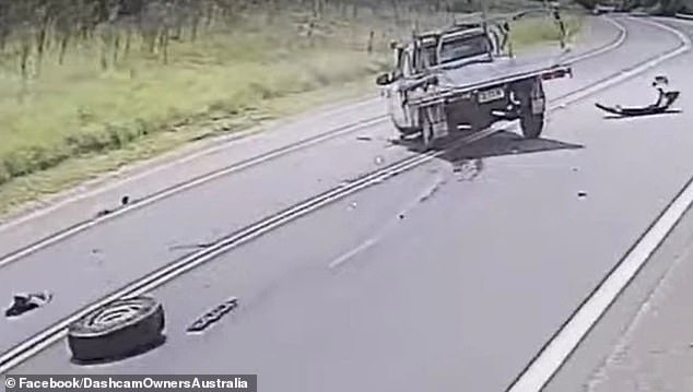 The driver of the ute (pictured), who fell asleep at the wheel, crossed the wrong side of the road before the vehicle collided with the sedan, causing traffic chaos