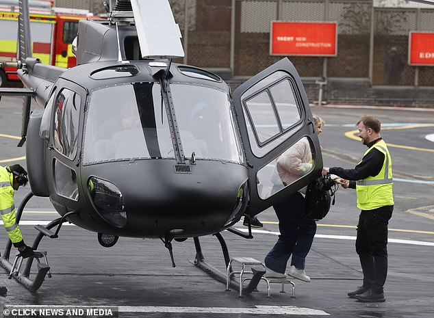 He was pictured jumping from the front of the plane before getting into a car waiting for them to land in the capital.