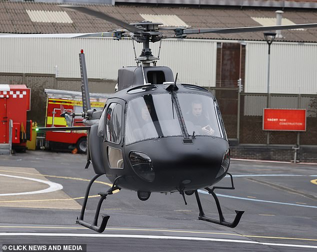 Tom and his co-pilot landed the plane on the helipad