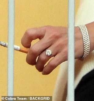 All eyes were on Britney's hand and the breathtaking round diamond