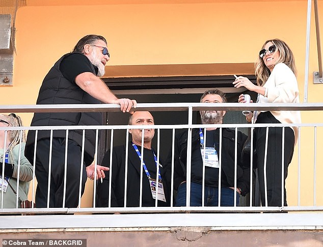 Britney enjoyed a drink while the pair soaked up the sun