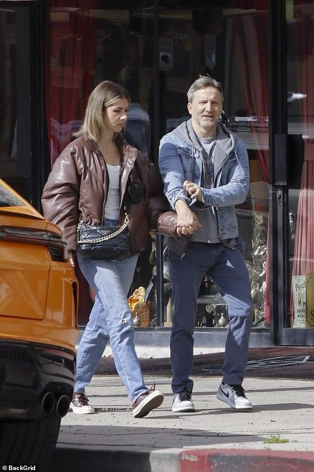 During their laid-back outing, the 44-year-old actress wore a brown leather jacket, white tank top and light-wash ripped jeans