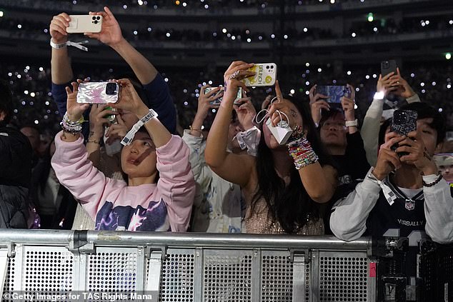 Performing some of her biggest hits in front of 55,000 fans, the pop star appeared in high spirits with a sparkling guitar in her hands and Swifties singing along to every song.