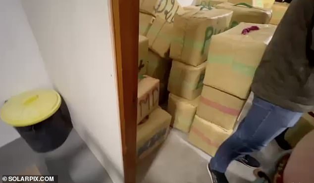 A storage room full of packages of cannabis.  One had the name 'Ralph' and the other 'Coly'