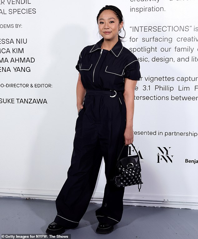 Stephanie Hsu opted for a black jumpsuit which was paired with leather boots and a patterned bag