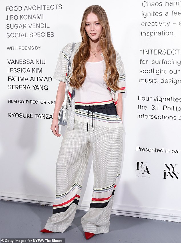 Larsen Thompson wore a partially sheer jersey-style top and matching pants on top of a low-cut white T-shirt, which was also contrasted with black athletic shorts