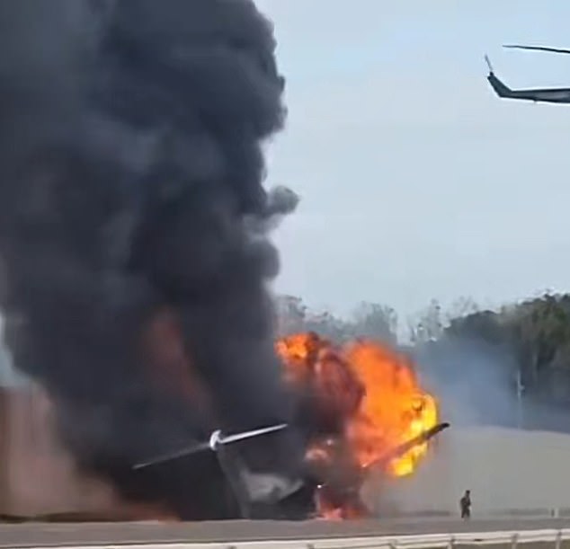 One video showed an explosion rocking the burning plane, and seconds later the charred left wing fell off