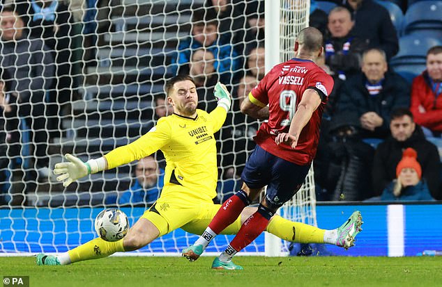 Butland saves Kilmarnock's Kyle Vassell during a Scottish Premier League match