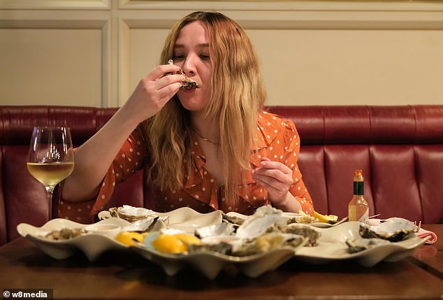 The reporter paired her oysters with lemon, Tabasco and a glass of white wine for the romantic date