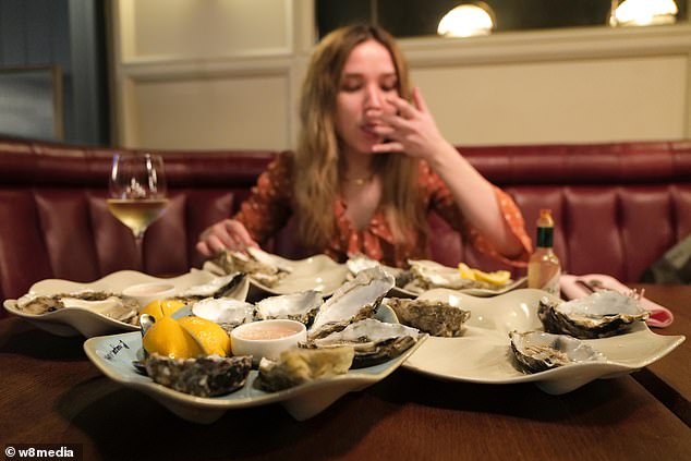 Kartik and Elmira enjoyed dinner with Burger & Lobster - and Elmira munched her way through 48 oysters