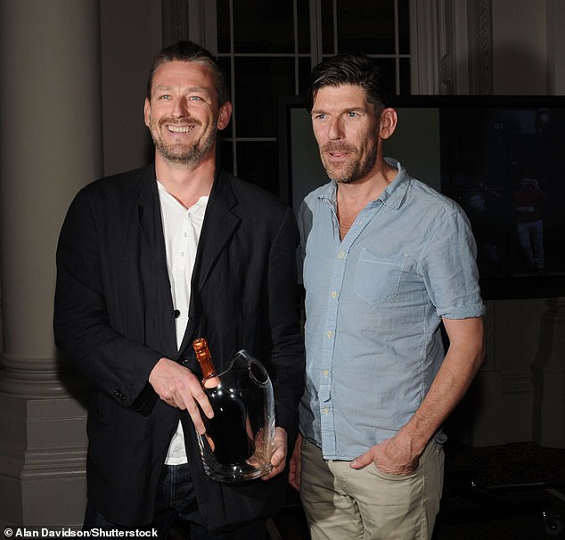 Mr Norman appointed his partner to take over his shares in his companies (photo with business partner Richard Beatty at The Tatler Restaurant Awards 2011)