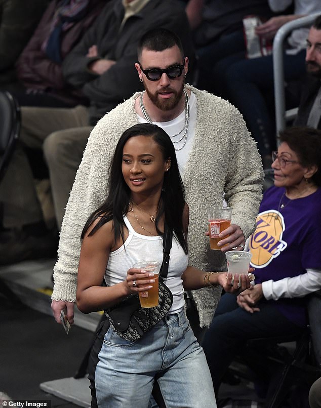 Kayla and Travis Kelce seen together at a basketball game in 2020. The couple split in 2022.