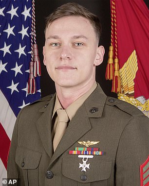 Sergeant Alec Langen, 23, of Chandler, Arizona, crew chief of the CH-53E