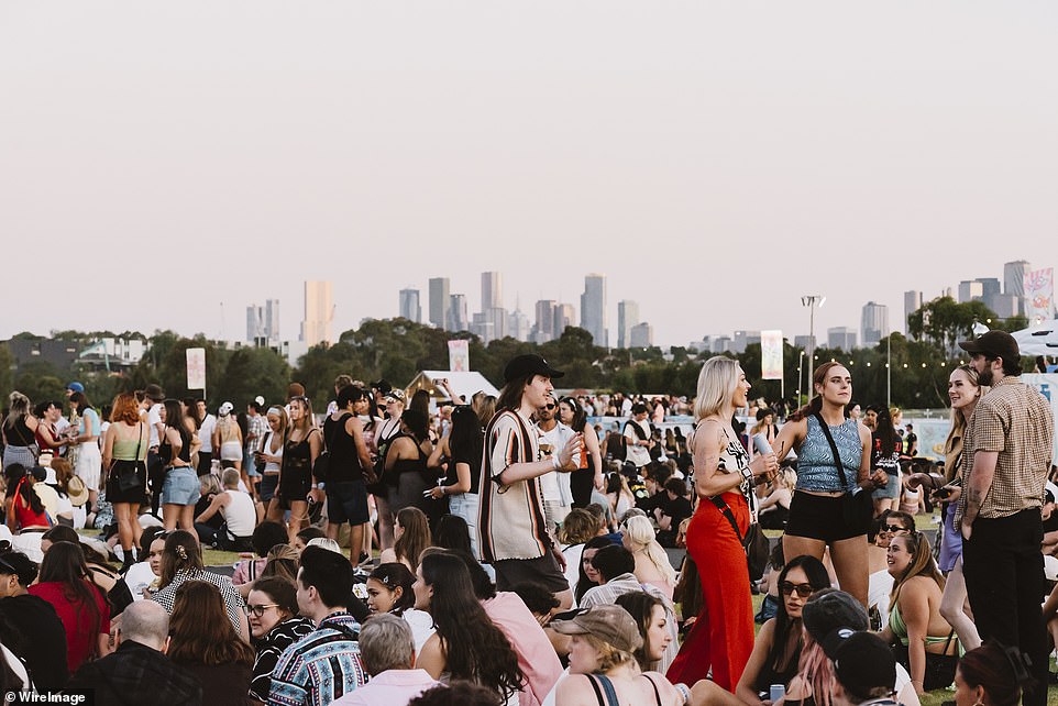 Festival goers enjoy the hot summer weather at the Melbourne show