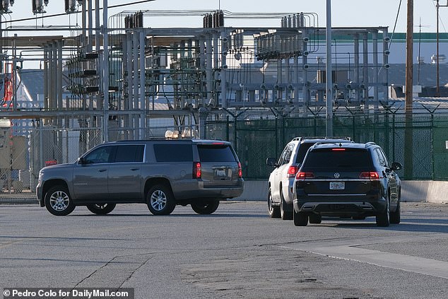 Swift's motorcade of SUVs drove away from the terminal to escort her to her LA home