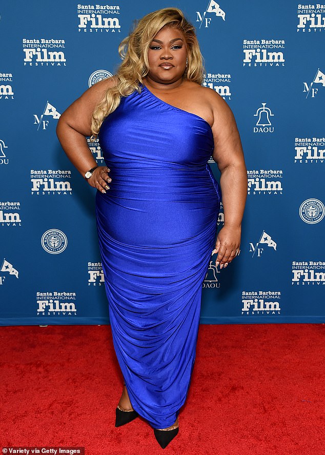 Da'Vine Joy Randolph stood out in a flowing navy dress and also wore jet black shoes at the film festival