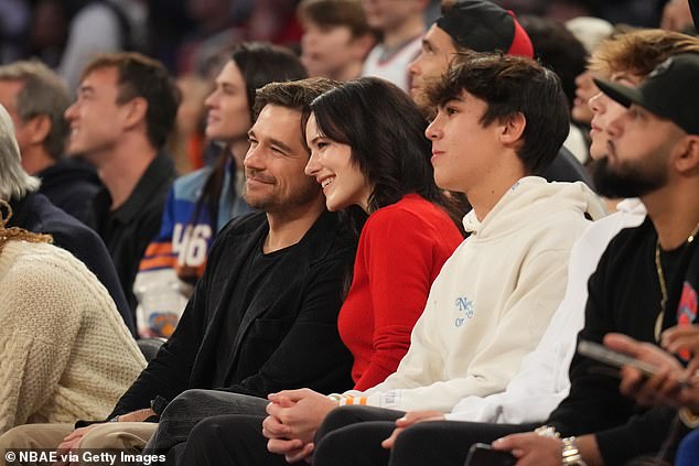 The actress was joined by her husband, Jason Ralph, who kept it casual in a plain black shirt, khaki pants and a black blazer.