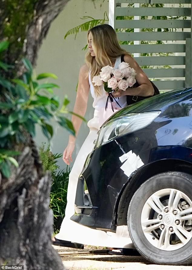 Margot looked radiant as she stepped out of her car