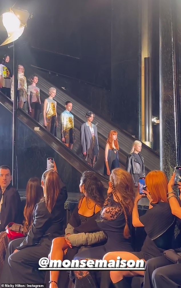 Hilton had a front row seat for all the action on the catwalk that started with the models riding an escalator into the lobby of Rockefeller Center