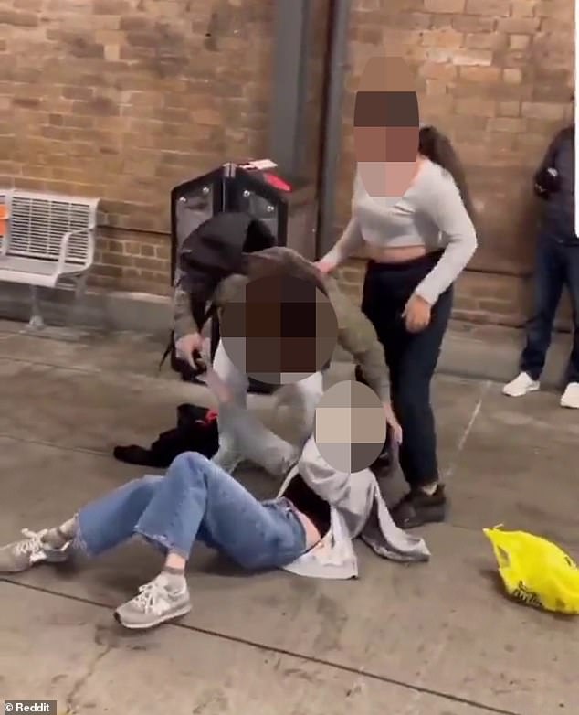 At one point in the footage, four girls were seen allegedly hitting, grabbing and pulling the hair of several women, causing one of the women to fall to the ground.