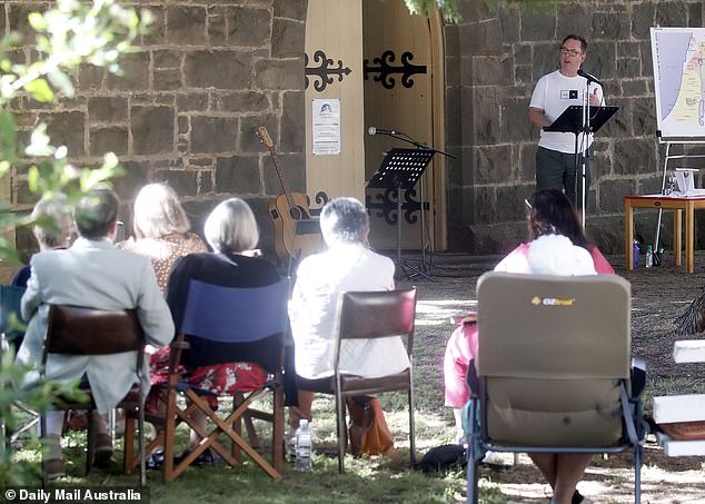 Reverend Mark Schnerring is pictured delivering his Sunday sermon.  He told churchgoers that the Murphy family would be in his prayers