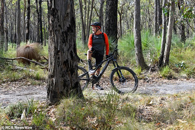 Pictured: A local man looking for Samantha Murphy on his bicycle on Saturday