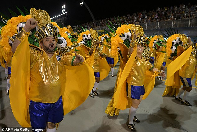 The twelve best samba schools in the country kicked off the annual parade in the gigantic Avenue, which has been converted into a stadium