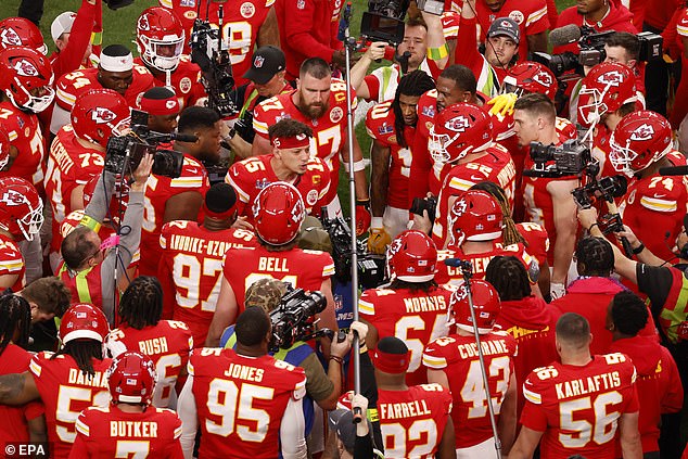 Patrick Mahomes (center) gives his team one last epic team talk before the Super Bowl begins