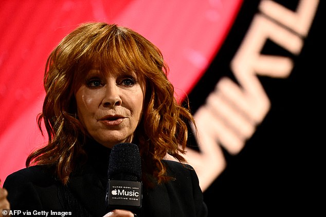 Also at the event was Reba McEntire, who opened Sunday's match with a moving rendition of the national anthem